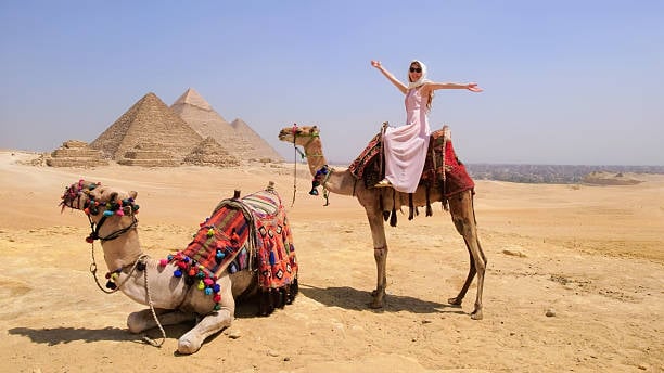Camel Ride at the Giza Pyramids | Explore Egypt's Timeless Desert - Slide 1